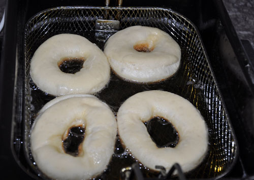 frying doughnuts